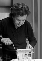 Elderly Woman Making Pasta