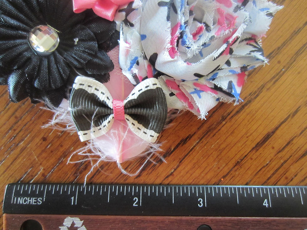 Thumbnail: Pink and Black Flowers With Pink Feather and Black/White Bow