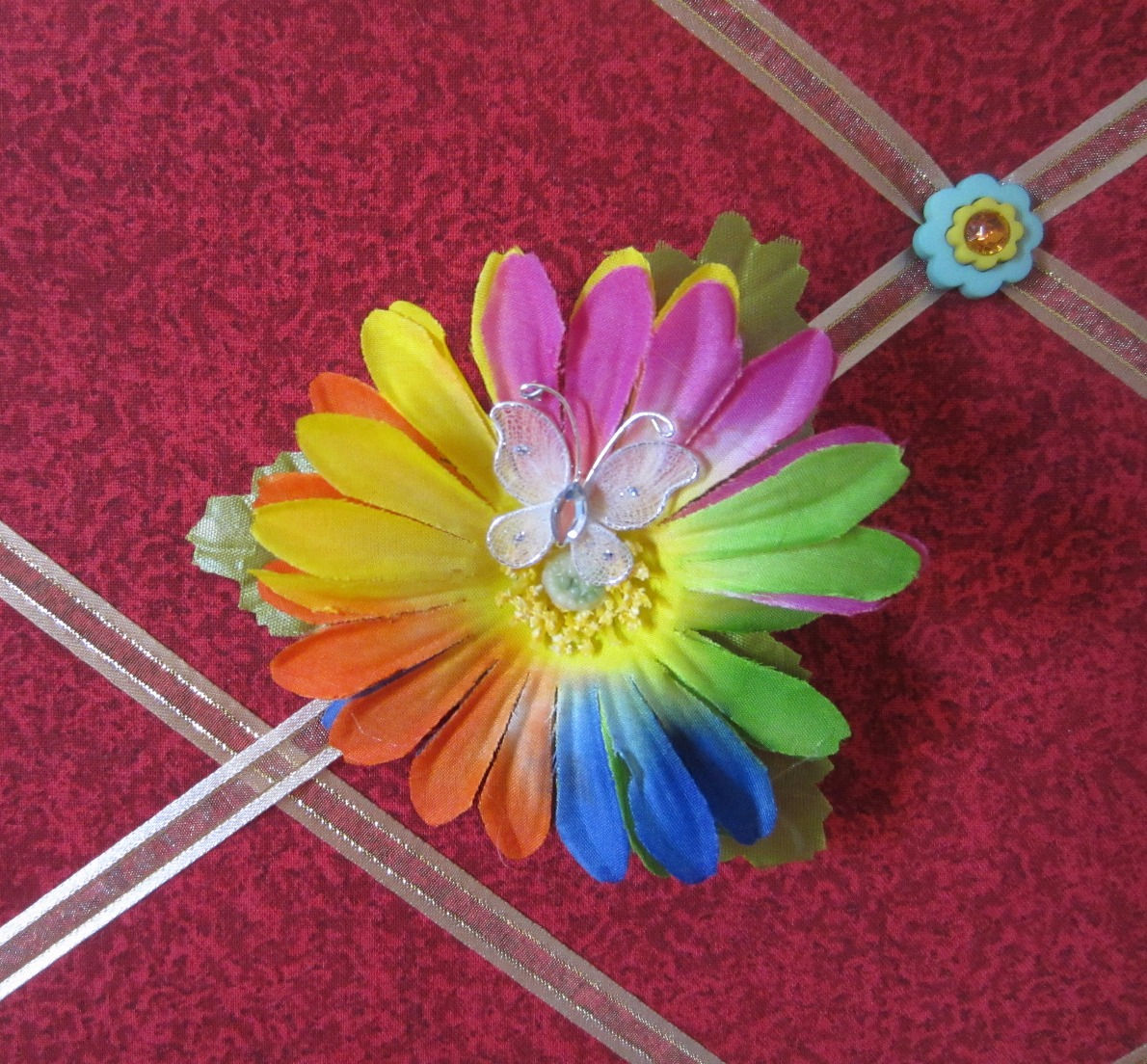 Multi-Colored Flower With White Butterfly