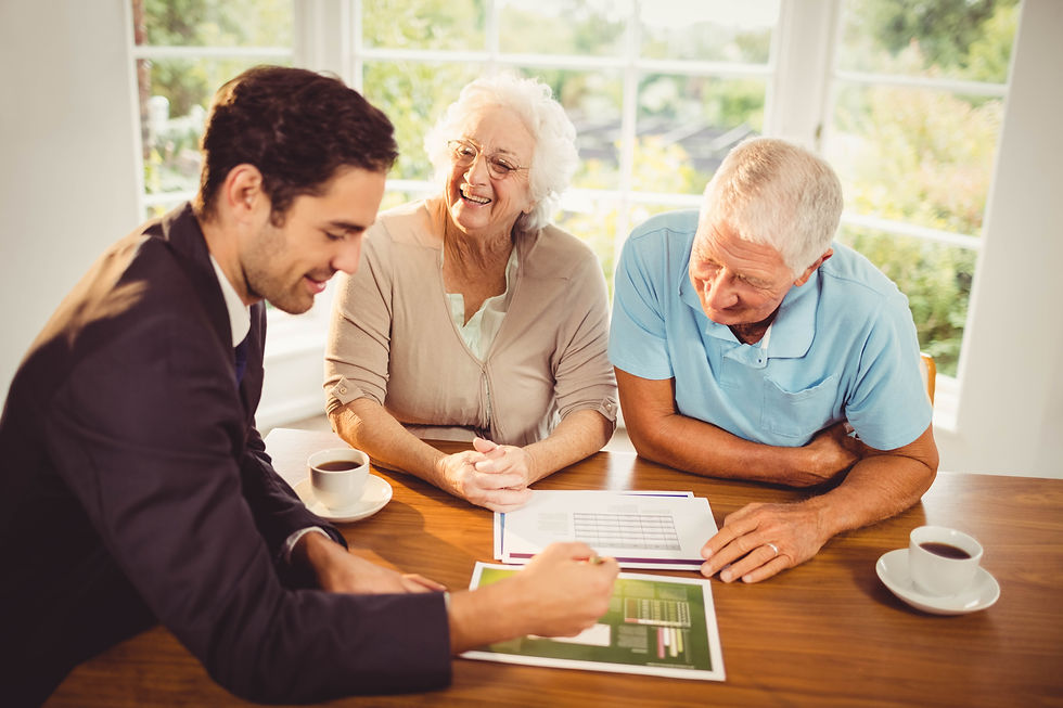 Financial advisor talking with senior clients
