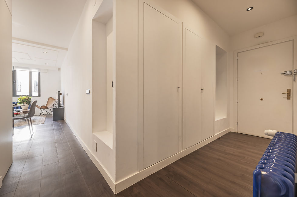 entrance hallway home with builtin wardrobes access living room with bright window