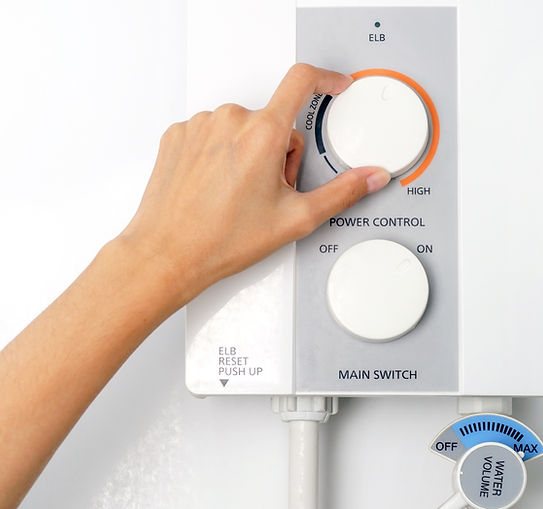 expert plumber doing inspection on water heater