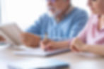 close-up of senior couple learning together about medicare