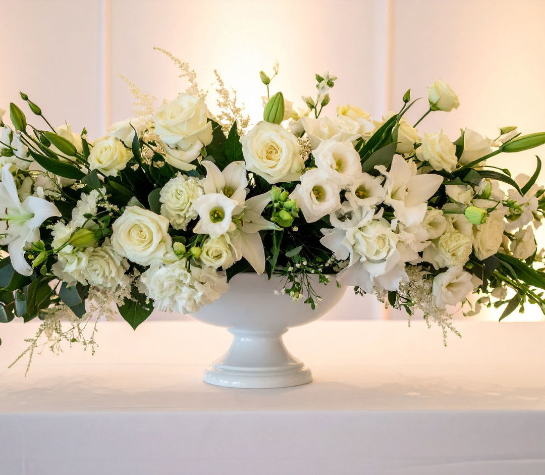 Lush Ivory Wedding Centerpiece with Orchids and Greenery