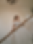 Bride in a white dress on a staircase during content creation