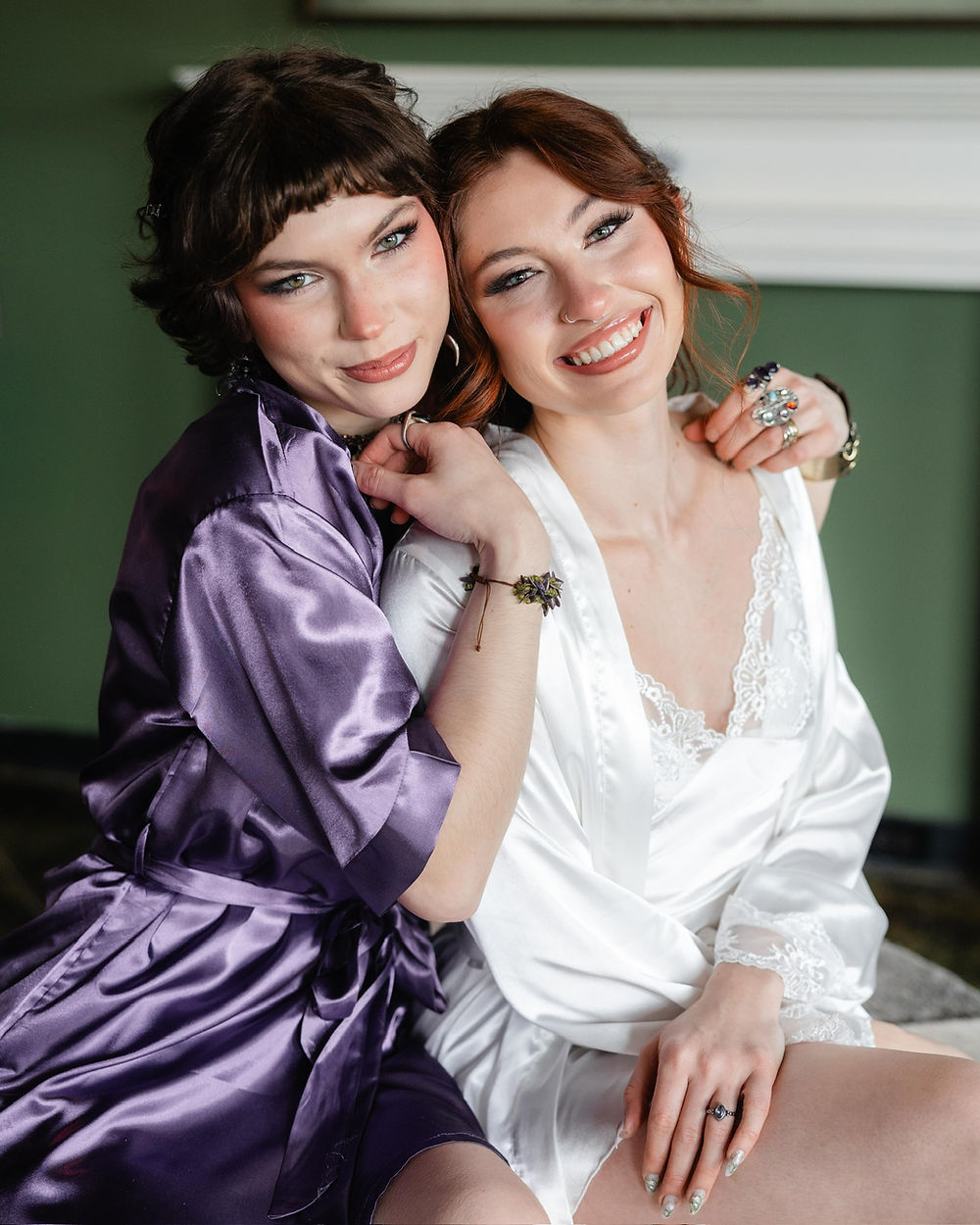 Two smiling women in robes, Analea Wedding Co.