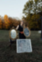 Woman with vintage mirrors for event rental West Virginia