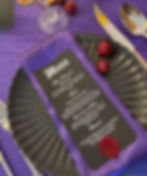 Menu on scalloped plate for an event rental in West Virginia
