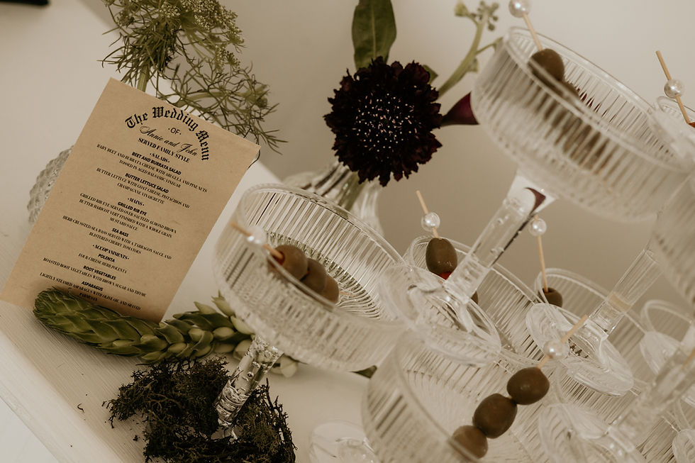 Close-up view of elegant acrylic wedding menu sign on reception table