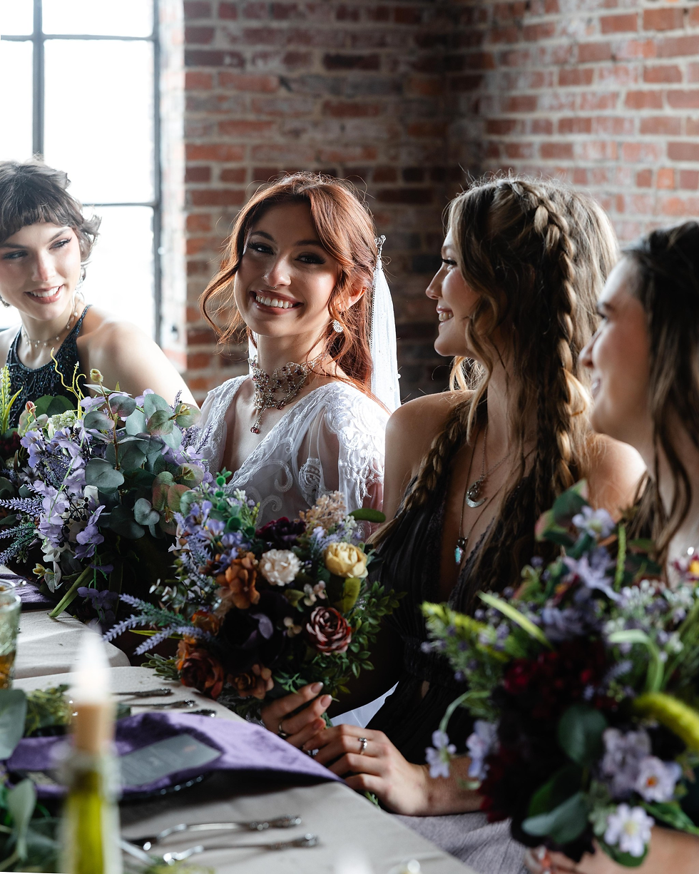 Wide-angle view of a whimsical styled shoot setup near large windows with a scenic Nashville backdrop.