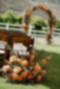 Outdoor event floral design Tennessee with orange roses