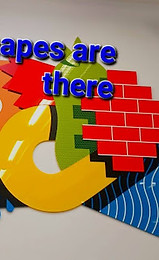 The picture shows a wall with some shapes and lines