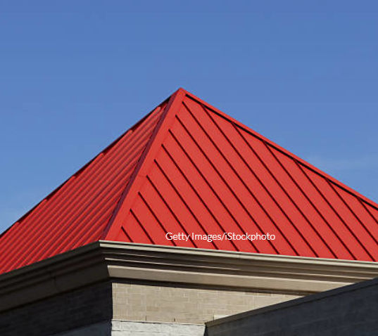A red house roof on the pyramid shape