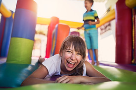Children Playing in Bouncy Castle