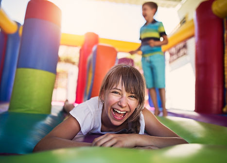 Children Playing in Bouncy Castle