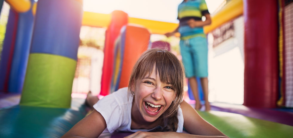 Children Playing in Bouncy Castle