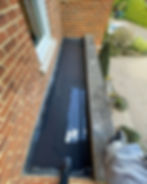 Gutter cleaning and maintenance service by Bennett Roofing, ensuring proper drainage and protecting the home in South London