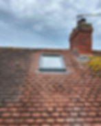 Roof repair work completed by Bennett Roofing, showcasing a durable new roof installation in Surrey