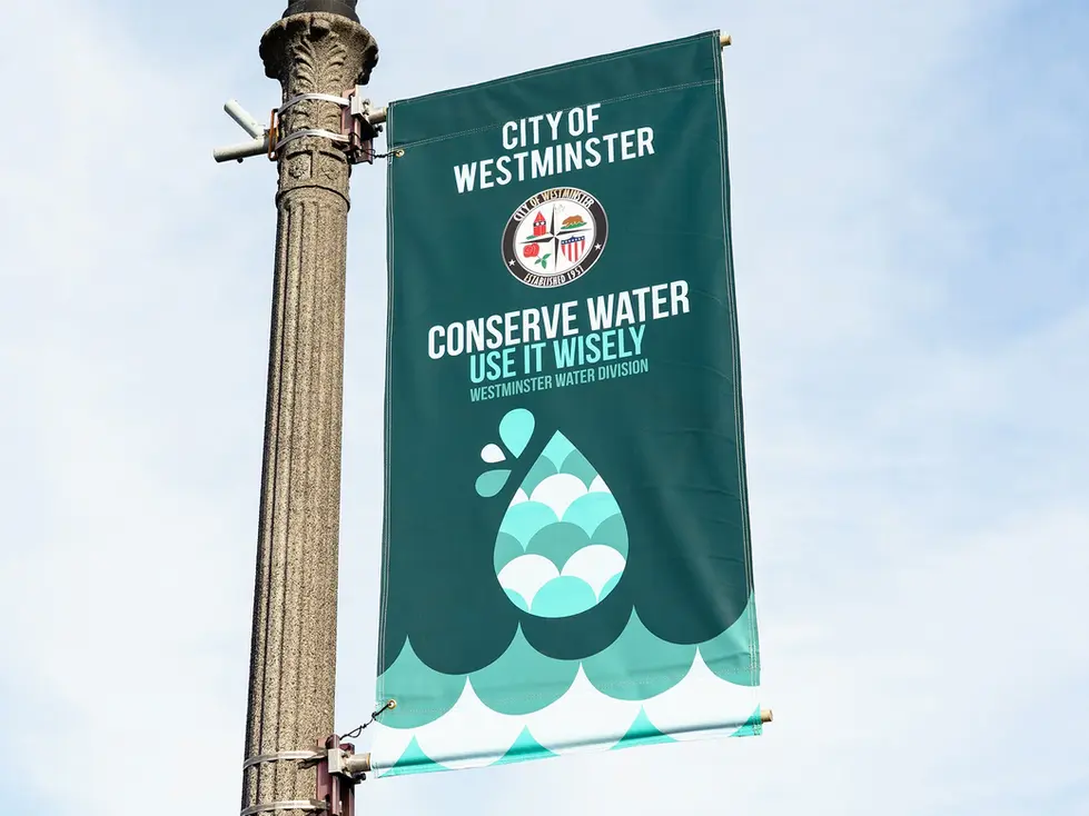 Street banner promoting water conservation in Westminster.