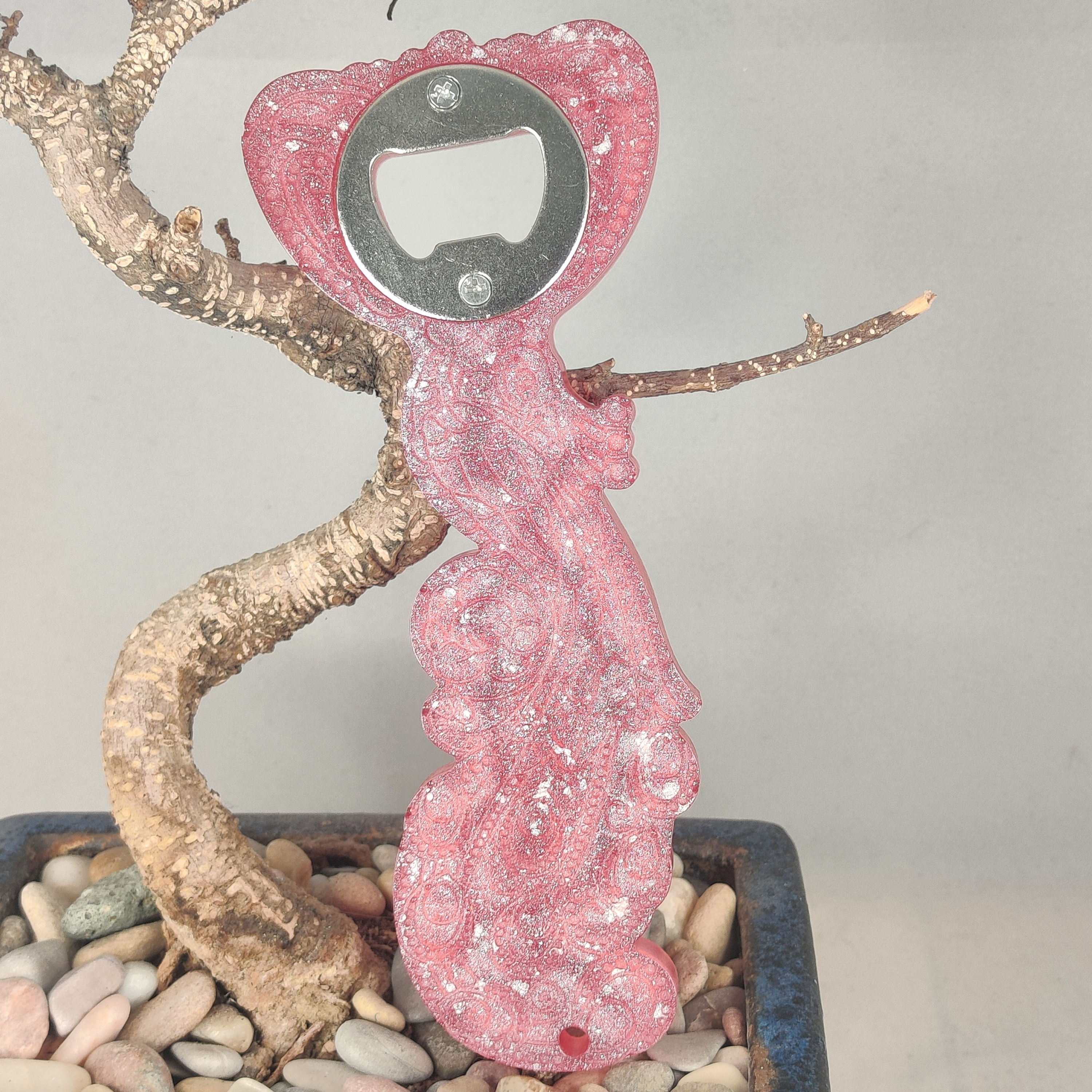 Décapsuleur paon fushia 