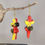 Miniature : Boucles d'oreilles croco rouge, jaune, noir
