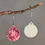 Miniature : Boucles d'oreilles bombe rose blanc