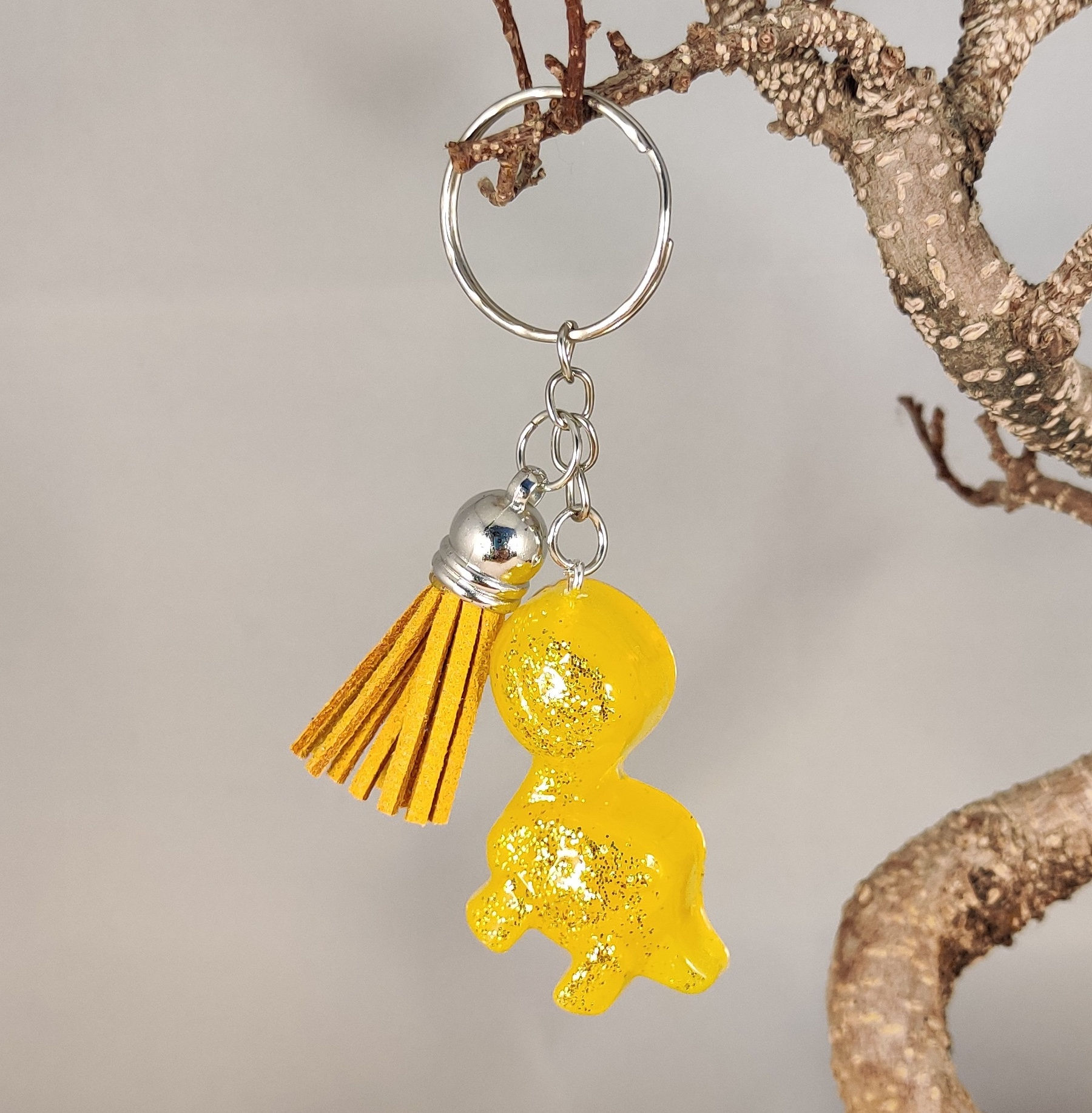 Porte clés diplodocus jaune