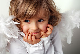 Child posing as angel