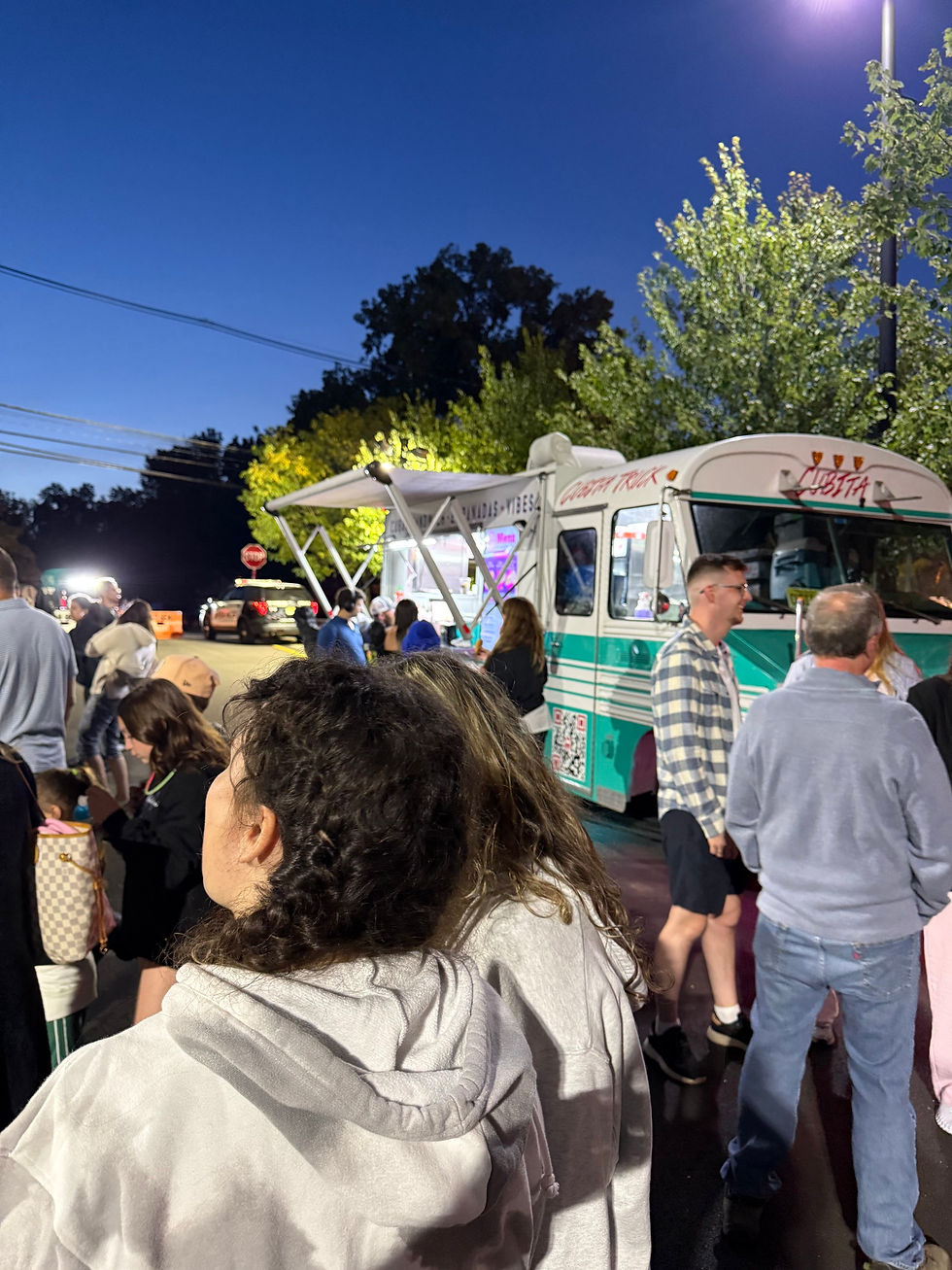 High angle view of a Cuban food truck parked at an outdoor event