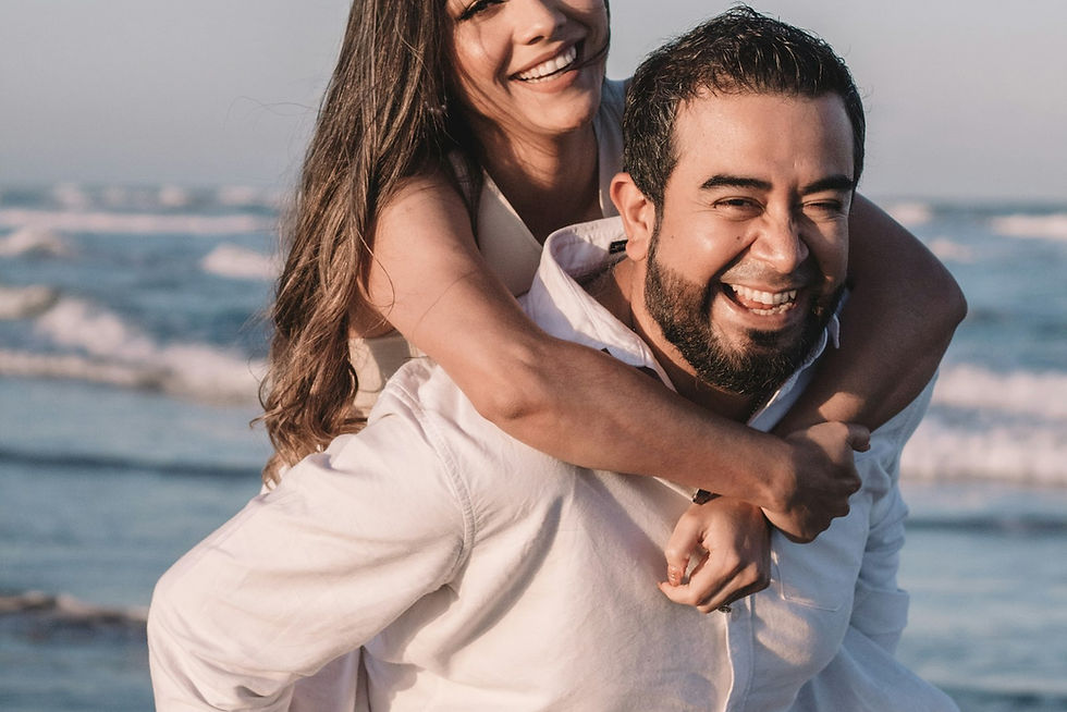 A man and woman embracing warmly, representing a couple who has rebuilt their connection through relationship counseling