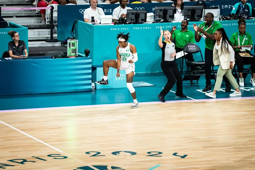 Thumbnail: Action shot of Ezinne Kalu playing in official white Olympic jersey for Team Nigeria