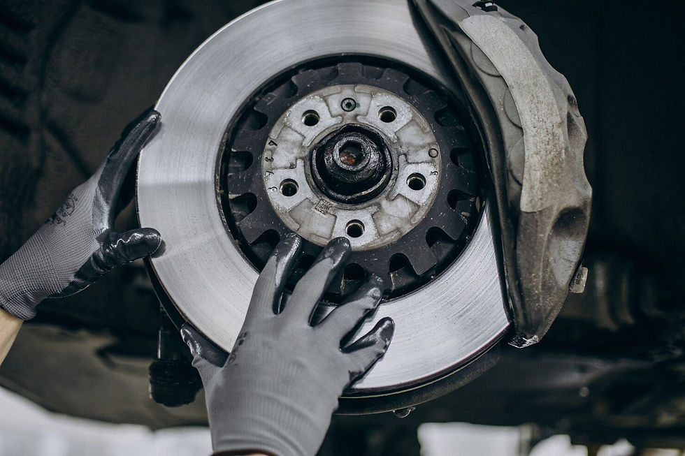 mechanic-changing-brake-discs-car-service_1303-26910.jpg