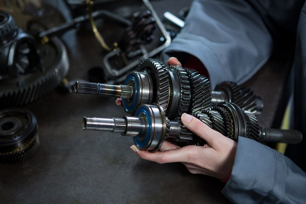 female-mechanic-holding-spare-parts-car_1170-1614.jpg