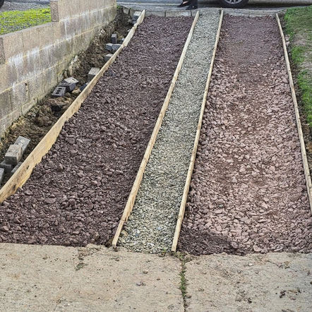 A picture showing hardcore before concrete in Rodborough.