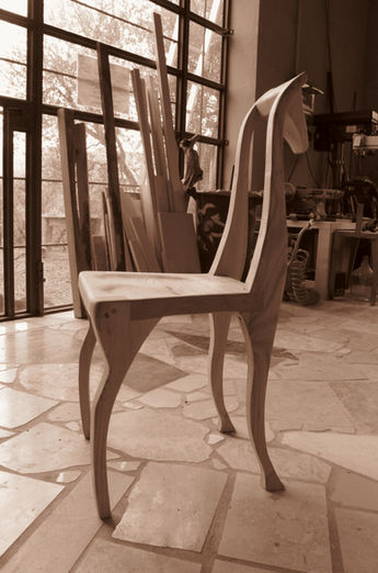 hand made walnut chair in the form of a horse