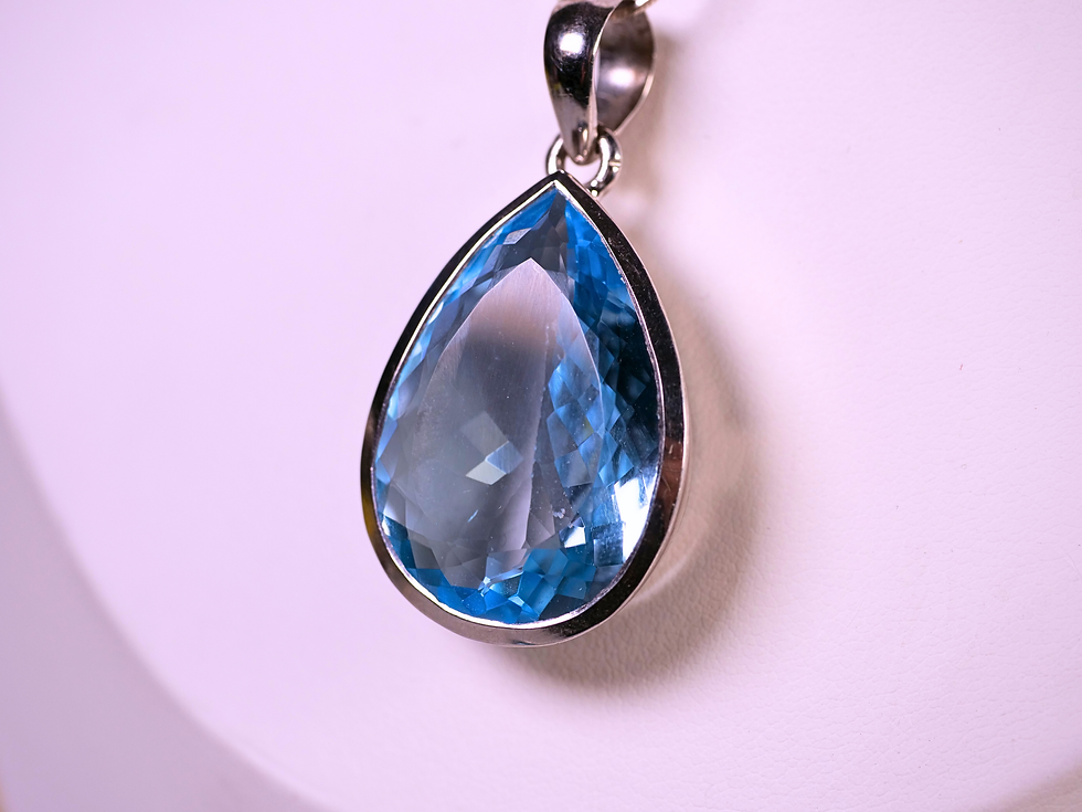 Thumbnail: blue topaz gemstone healing, blue topaz silver handcrafted, blue topaz gentle energy, blue topaz modern jewelry,