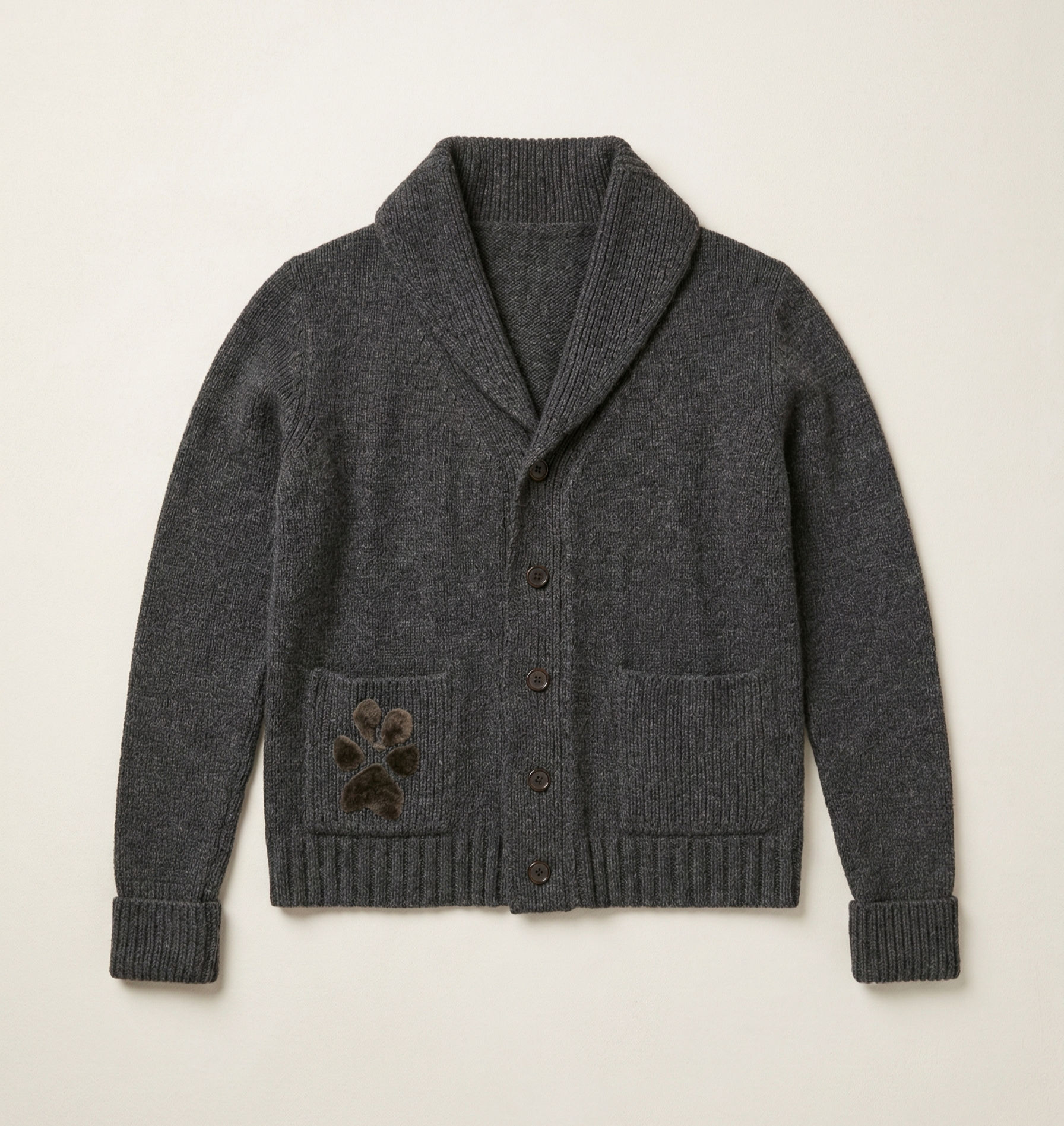 charcoal grey man's 100% cashmere shawl collar cardigan with buttons and pockets, featuring a custom felted paw print motif