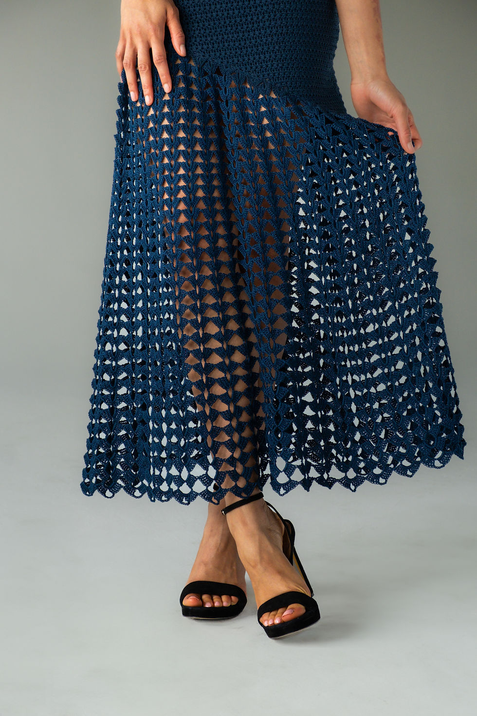 Thumbnail: hand-crocheted petroleum blue dress with solid bodice and openwork skirt, wide straps and asymmetrical lace hem