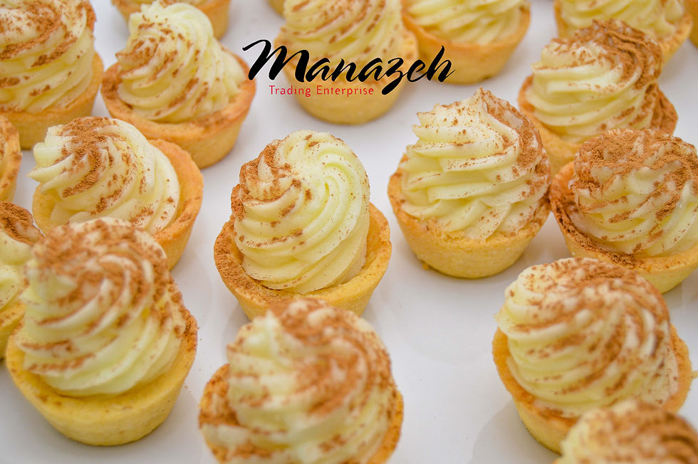 Mini cupcakes with creamy frosting and cinnamon dusting, a gourmet dessert catering services in Gauteng