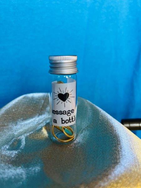 Thumbnail: "message in a bottle" "LOVE" Gold