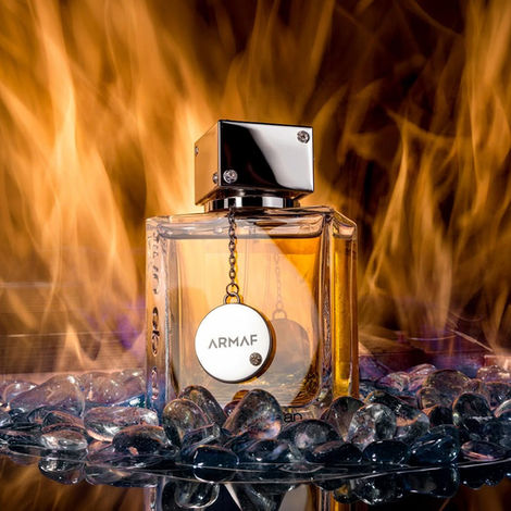 mens cologne nightclub by armaf on hot coals and in the fire shot by Calgary product photographer