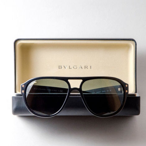 Bvlgari sunglasses resting in case during a product shoot by branding photographer in calgary