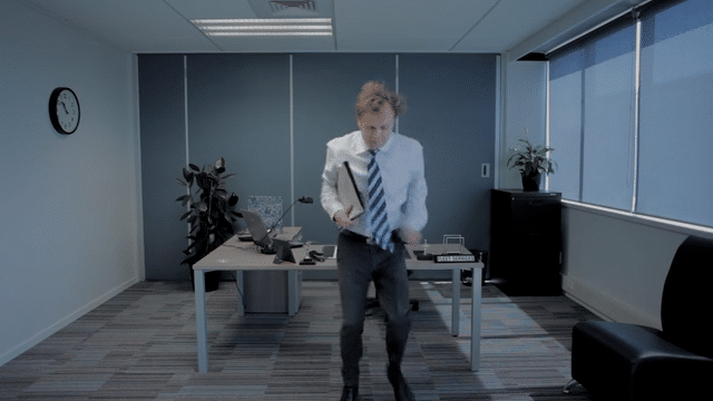 Office workers pretending to work hard — running, splashing water, and chewing pencils — with Leaseplan making the tough tasks disappear.