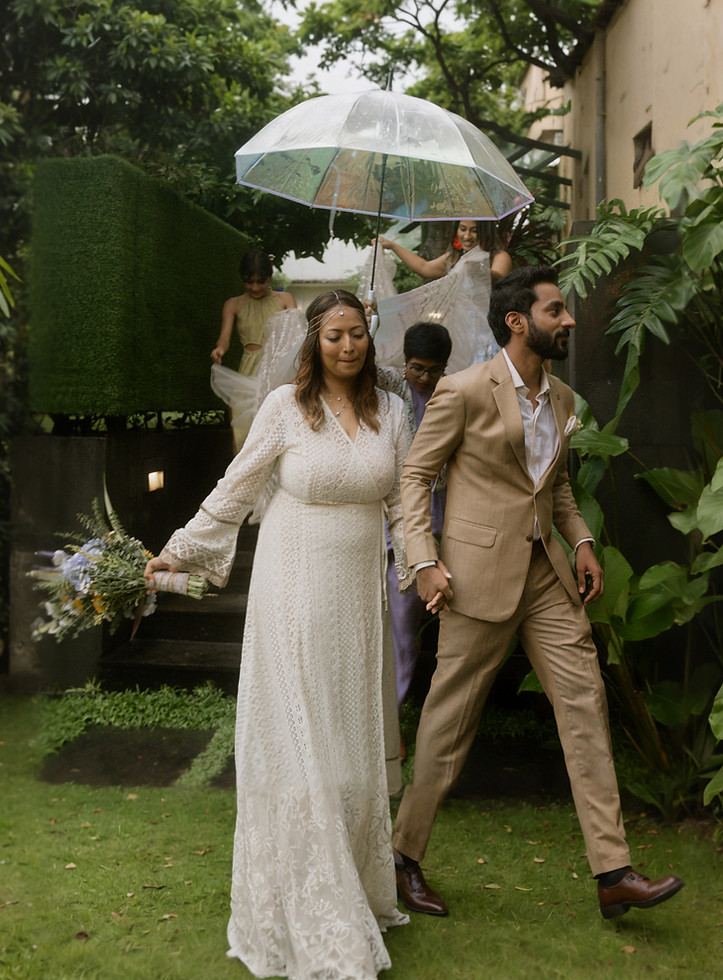 Bride and groom holding hands