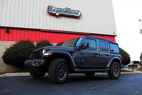 Jeep Tint Service
Tinted Jeep outside of Roger Stereo Storefront 