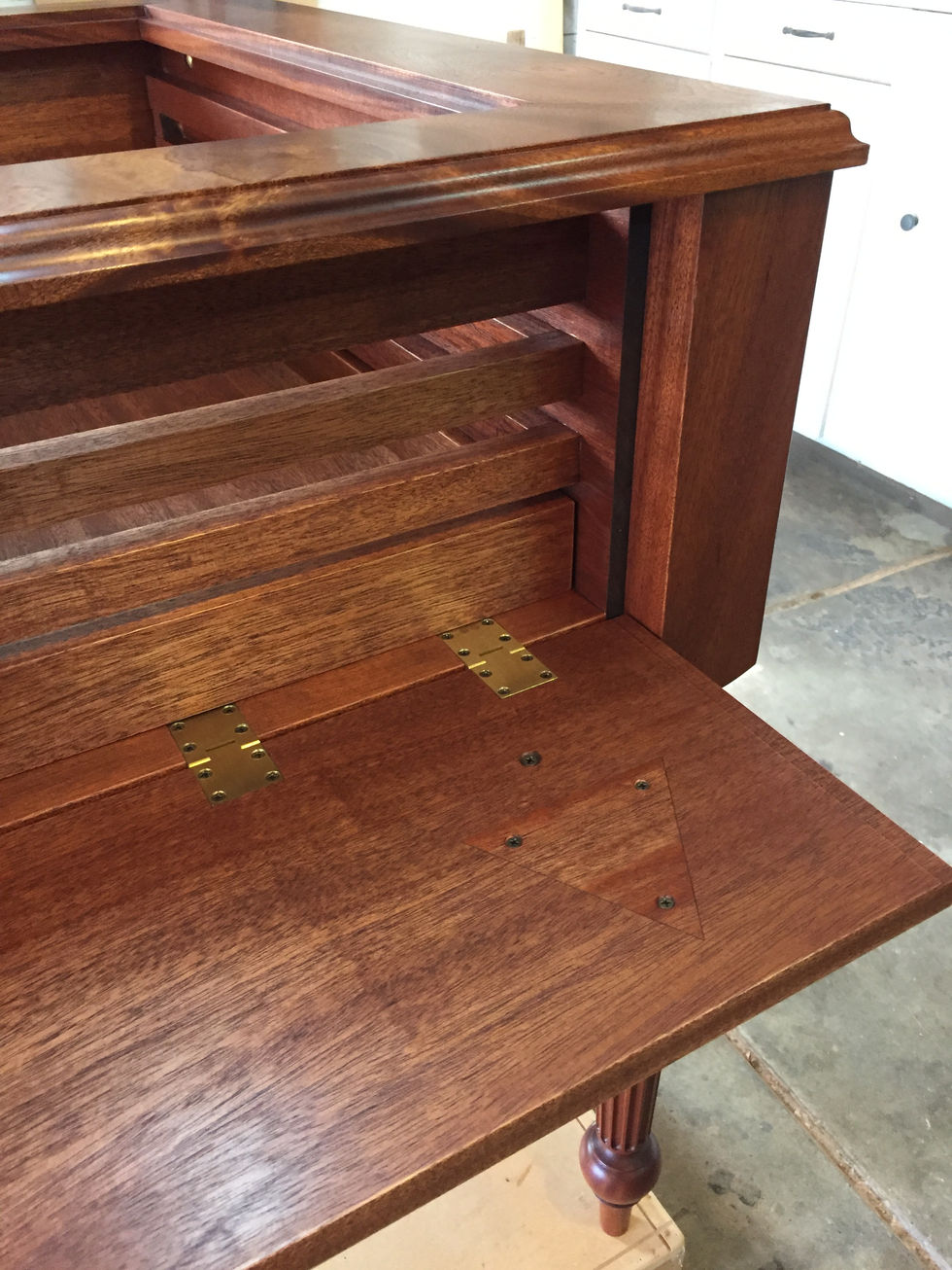 hidden mechanisms, secret cabinet hardware, fine art, bespoke furniture, museum display lantern slides
