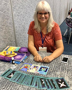 Kim giving a professional angel reading with oracle cards