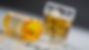 Treken-100 Tramadol bottle with pills and alcohol glass.