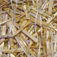 Straw fill with photodegradable netting for an erosion control blanket