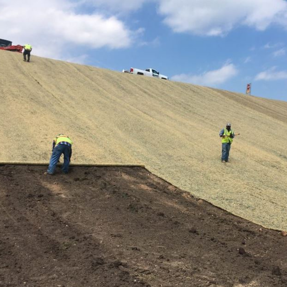 Laying erosion control blankets